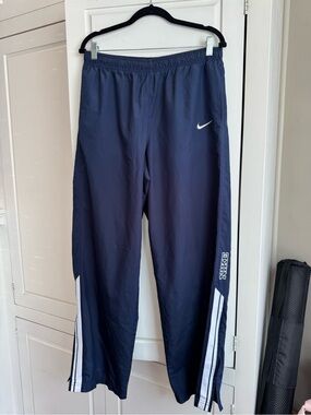 Nike Navy Track Pants with White Stripe Accents